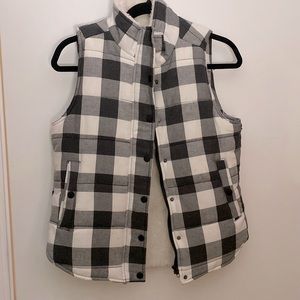 Fuzzy black and white plaid vest. Size small